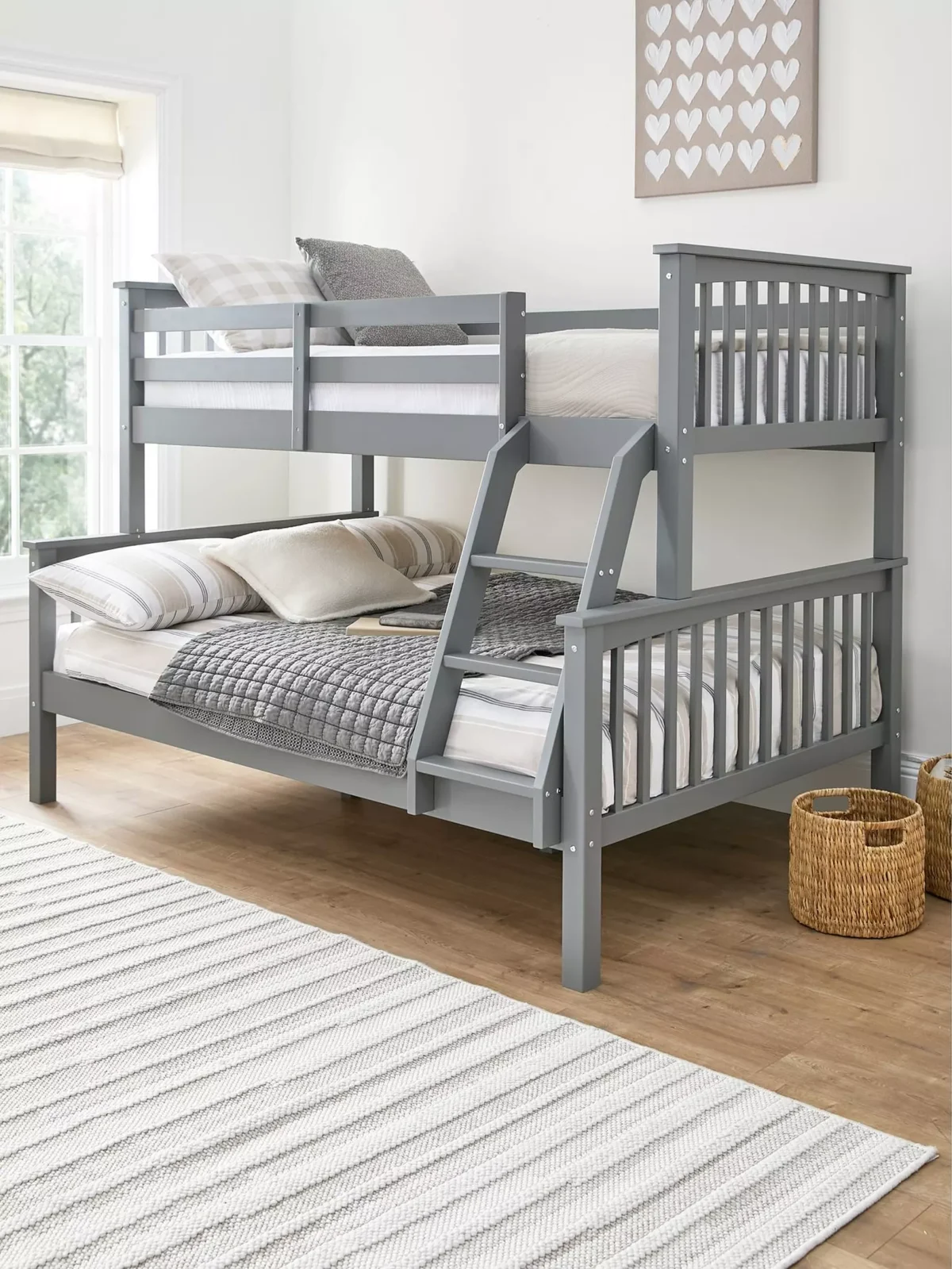 Grey triple bunk bed with sturdy metal frame and sleek style